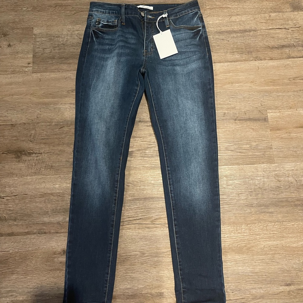 Size 11 dark skinny jeans. Never worn.